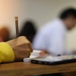 Hand,Holding,Pencil,,Selective,Focused,Picture,Of,A,Hand,Of